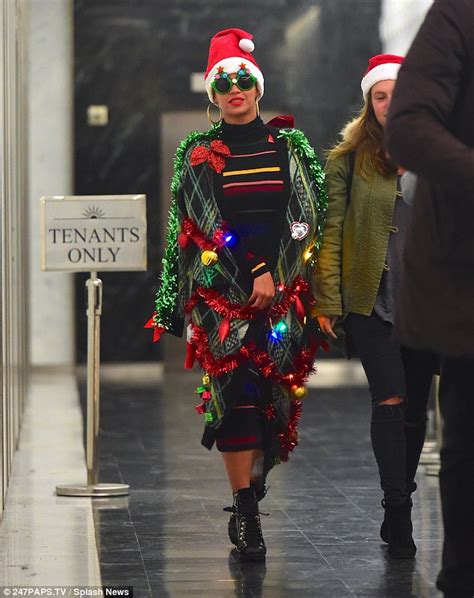 Beyonce wraps herself up in tinsel as she sports wacky Christmas costume for holiday party ...