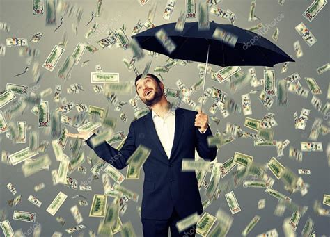 Man standing under money rain Stock Photo by ©konstantynov 49286917