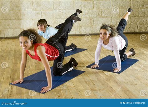 Stretching exercise on mat stock image. Image of smiling - 4241153