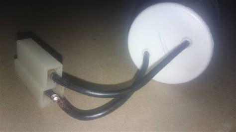 high voltage - How do I safely discharge this capacitor with broken wire? - Electrical ...