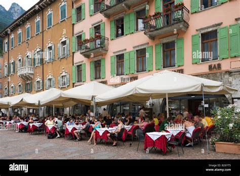 Restaurant in the town centre near the harbour, Riva del Garda, Lake ...