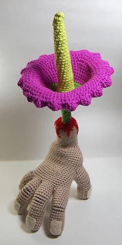Ravelry: Severed Hand with Corpse Flower pattern by Jody Rhodenizer