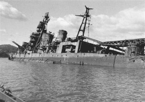 The Japanese heavy cruiser Аоbа lies in shallow waters in Kure on July ...