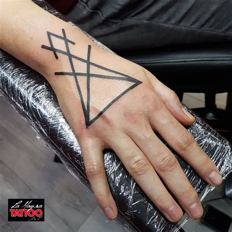 marilyn manson double cross tattoo - Sasha Serrano