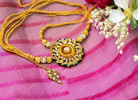 Premium AI Image | Mangalsutra or Golden Necklace to wear by a married hindu women arranged with ...