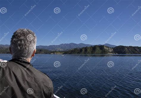 Senior Man Enjoys Wildlife Boat Tour Around Cachuma Lake Editorial Photography - Image of enjoys ...