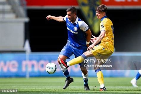 Cuypers Hugo forward of KAA Gent battles for possession with... News ...