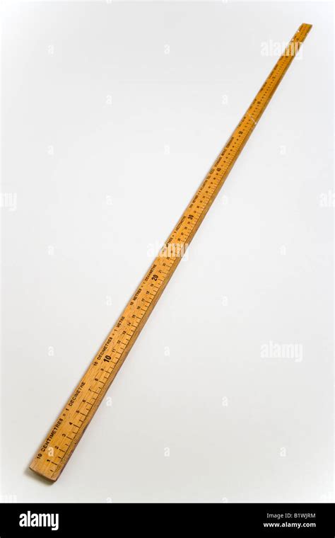 MEASUREMENT Metric Tools Wooden metre long ruler with measurements in ...