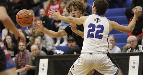 PHOTOS: Action between the St. Thomas More boys basketball and Douglas