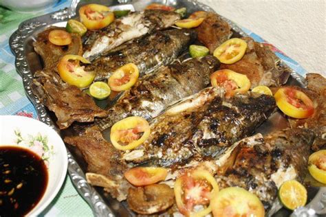 Yummy "inihaw na tilapia" | Food, Grilled tilapia, Pinoy food