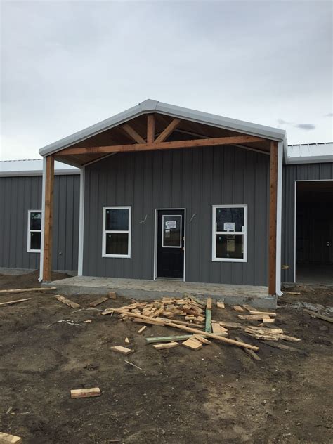 Front of my Barndominium. Cedar trusses are complete. #cedar #trusses #porch Steel House ...