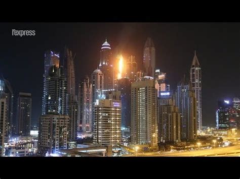 Un incendie ravage un gratte-ciel à Dubaï - YouTube