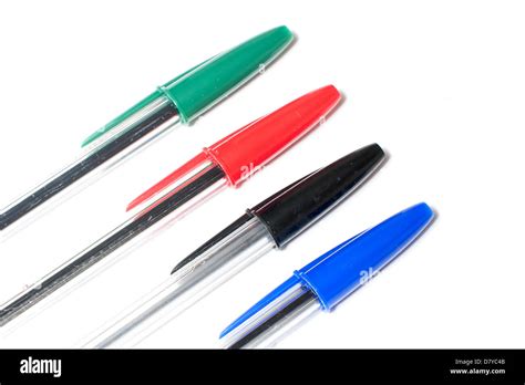 A collection of green, red, black and blue biro pens Stock Photo - Alamy