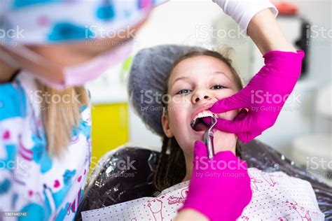Baby Teeth Extraction Stock Photo - Download Image Now - Teeth, Dental Filling, Removing - iStock