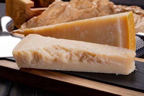 Aged Italian Parmesan Hard Cheese Parmigiano-Reggiano with Cheese Knife Stock Image - Image of ...