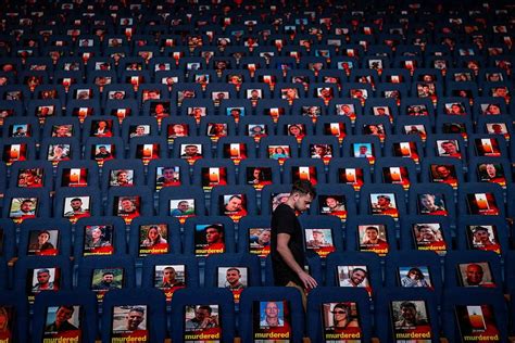 Tel Aviv University exhibit fills seats with photos of victims of Hamas ...