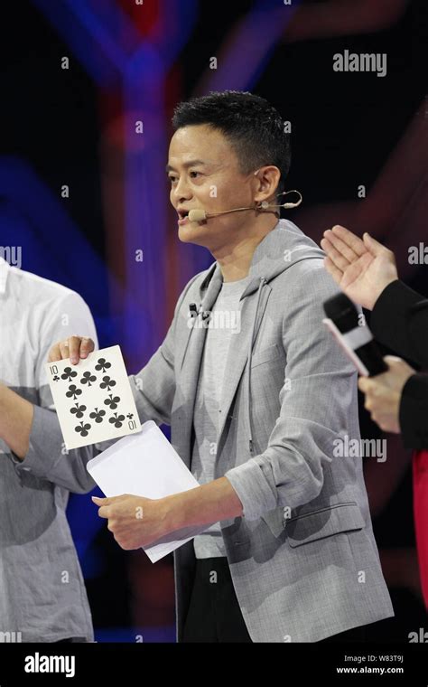 Jack Ma or Ma Yun, Chairman of Alibaba Group, performs a magic show during a gala for the Tmall ...