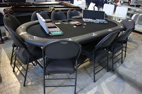 POKER TABLE (GAMES TABLE) WITH 10 FOLDING CHAIRS, PAIR OF POKER CHIP SETS AND MORE ACCESSORIES