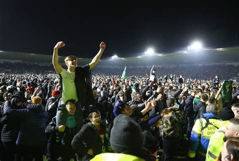 Moment Plymouth Argyle fans storm Home Park pitch to celebrate Wembley ...