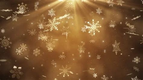 Beautiful snowflakes falling on golden b... | Stock Video | Pond5