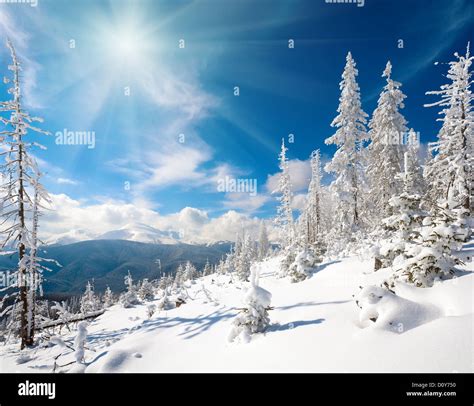 Snowy mountain sunshine landscape Stock Photo - Alamy