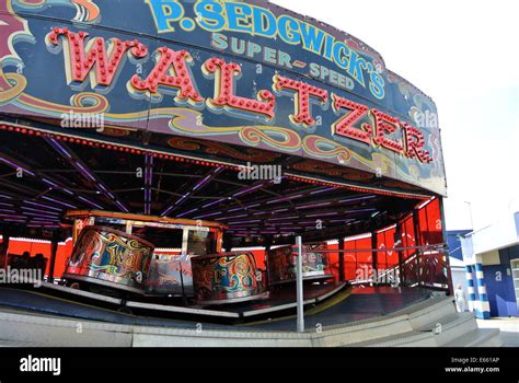 Blackpool Pier, funfair rides, The Waltzer ride Stock Photo - Alamy