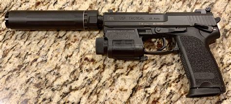 Suppressed HK USP-T 45 : r/guns