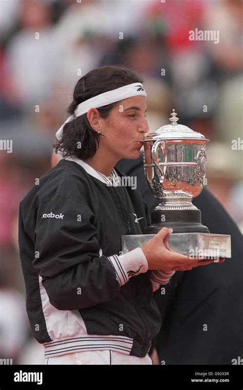 Arantxa sanchez vicario kisses the trophy after winning the french open ...