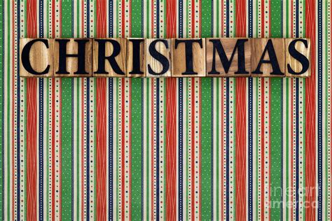 Christmas text on striped background Photograph by Richard Thomas - Pixels