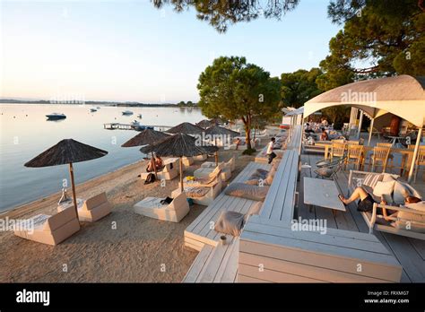 Beach bar of a hotel in the evening, Vourvourou, Sithonia Stock Photo ...