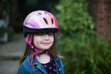 "Smiling Girl Wearing A Bike Safety Helmet" by Stocksy Contributor ...