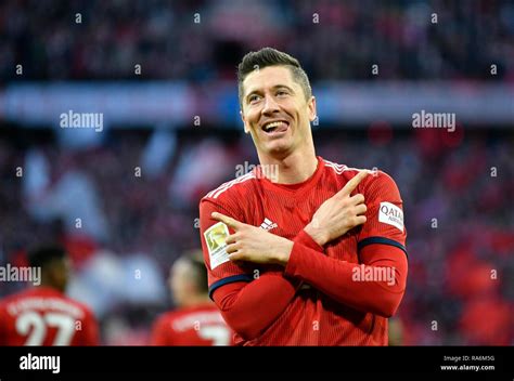 Typical goal celebration with crossed arms and outstretched tongue, Robert Lewandowski, FC ...