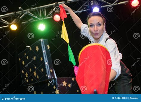 Magician Woman Performing on Stage Stock Image - Image of shot, female: 143748683