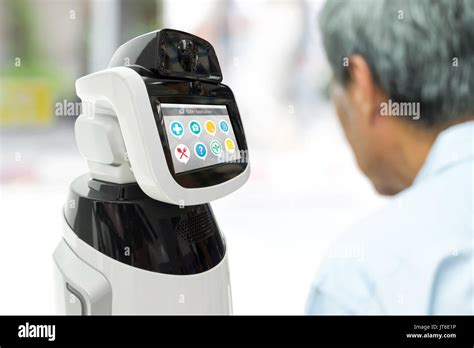 Robot Assistant healthcare helping elder with application. Artificial ...