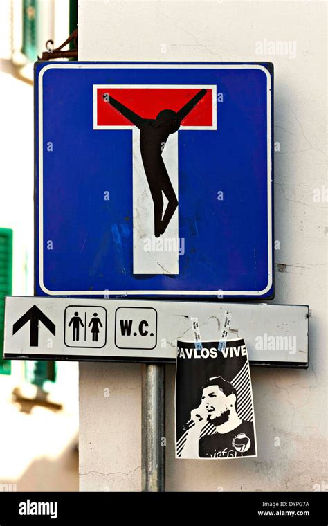 Graffiti on a no through road traffic sign of Jesus on cross, Florence ...