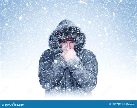 Frozen Man in Winter Clothes Warms His Hands, Cold, Snow, Frost ...