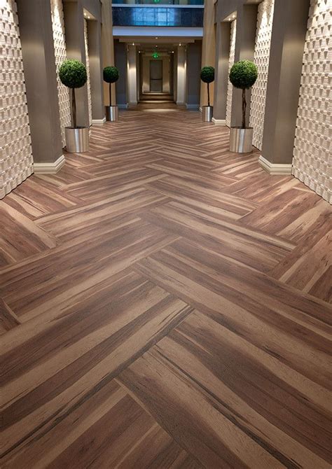 Hotel corridor featuring Affinity255 Smoked Walnut vinyl flooring in ...