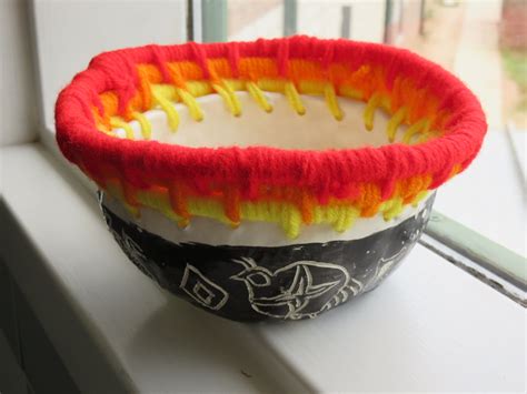 5th grade Native American style yarn weaving with white clay sgraffito base; lesson by art ...