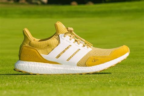 Extra Butter x Happy Gilmore x adidas Ultra Boost 1.0 Gold Jacket Release Date Info | SneakerFiles