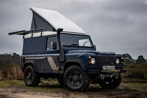 This Land Rover Defender camper’s pop-up roof unveils a lavish wooden cabin - Flipboard