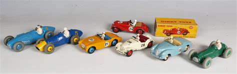 Seven Dinky Toys sports and racing cars, comprising No. 108 MG Midget Sports, boxed, No. 109 Austin