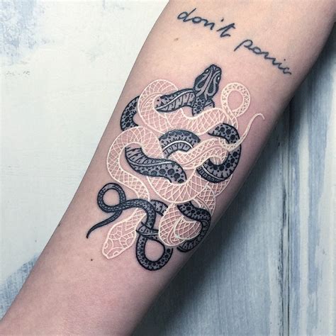 Intricate Black & White Snake Tattoos By Mirko Sata