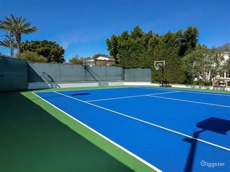 Graceful Blue Tennis Court | Rent this location on Giggster