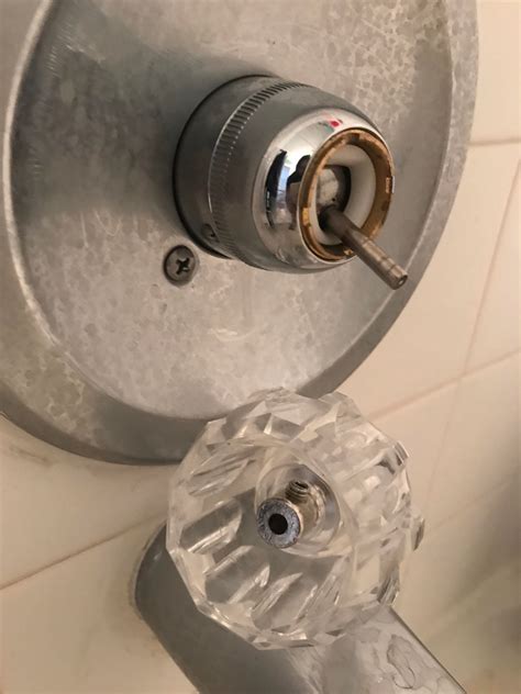 Cheap shower knob keeps falling off. No matter how many times I tighten ...