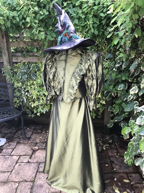 Ladies Victorian Green Witch Costume For Hire. Halloween Fancy Dress