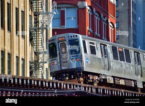 Chicago, Illinois, USA. A CTA Orange Line rapid transit train entering ...