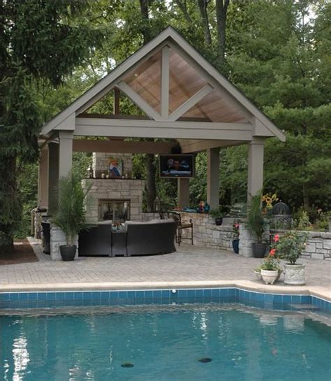 Pool pavilion with fireplace. | Backyard pavilion, Backyard patio ...