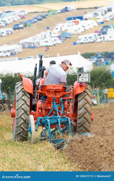 Vintage Orange Nuffield Tractor Ploughing Editorial Photography - Image of grey, antique: 100672712