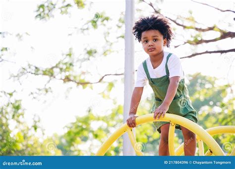 Cute African American Little Kid Boy Having Fun while Playing on the ...