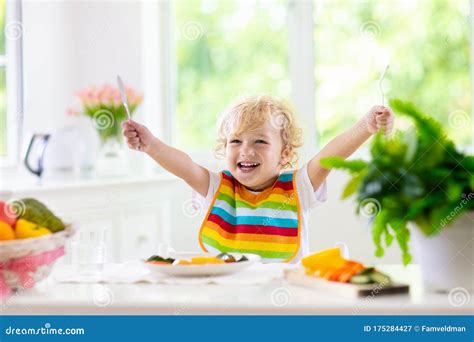 Baby Eating Vegetables. Solid Food for Infant Stock Image - Image of ...